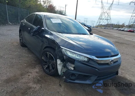 2018 Honda Civic Touring z USA, uszkodzony, nr VIN JHMFC1F90JX013058